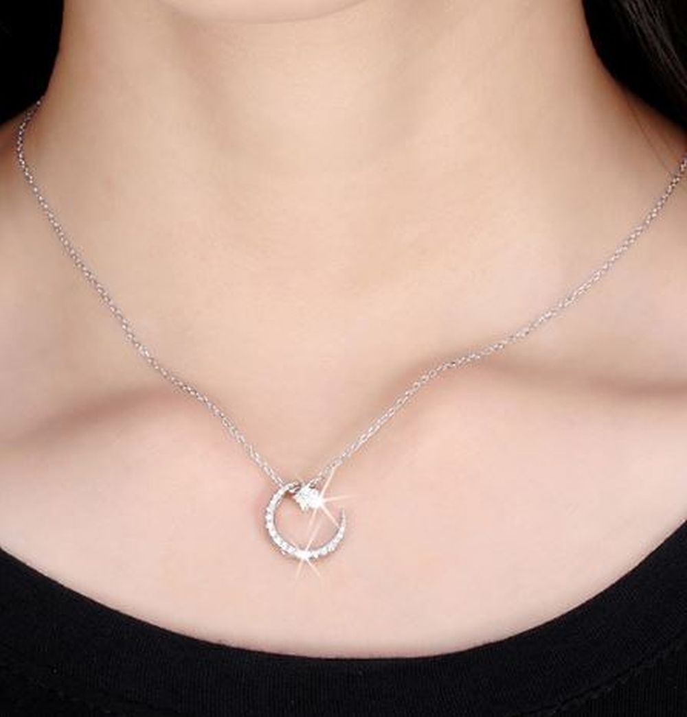 Halskette mit Anhänger Mond & Stern mit Zirkonia